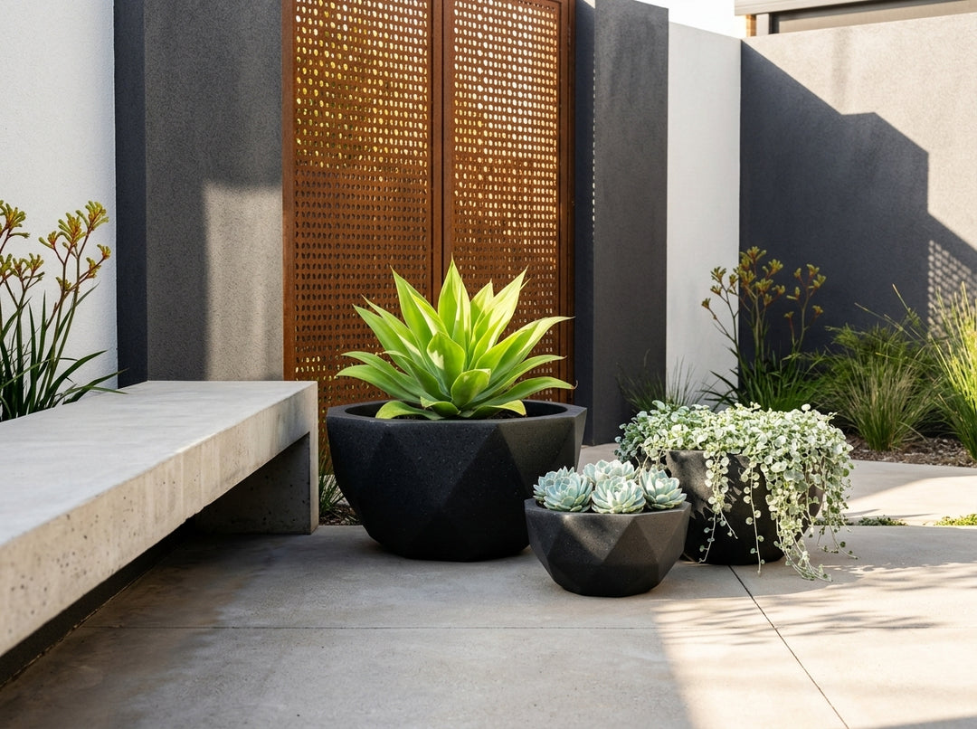 Geo Bowl terrazzo planter pots (Set of 3) in Onyx black styled in an Adelaide garden — Small 6L, Medium 16L, Large 38L; lightweight fibre-clay, indoor or outdoor.