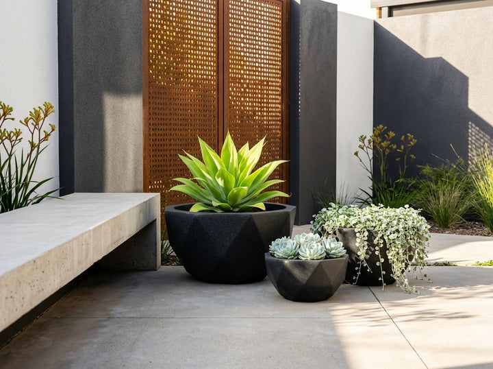 Geo Bowl terrazzo planter pots (Set of 3) in Onyx black styled in an Adelaide garden — Small 6L, Medium 16L, Large 38L; lightweight fibre-clay, indoor or outdoor.