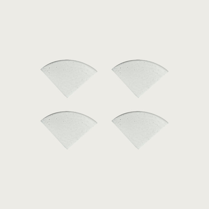 Four Arctic crisp white terrazzo pot feet — one set of four, for a round or square pot