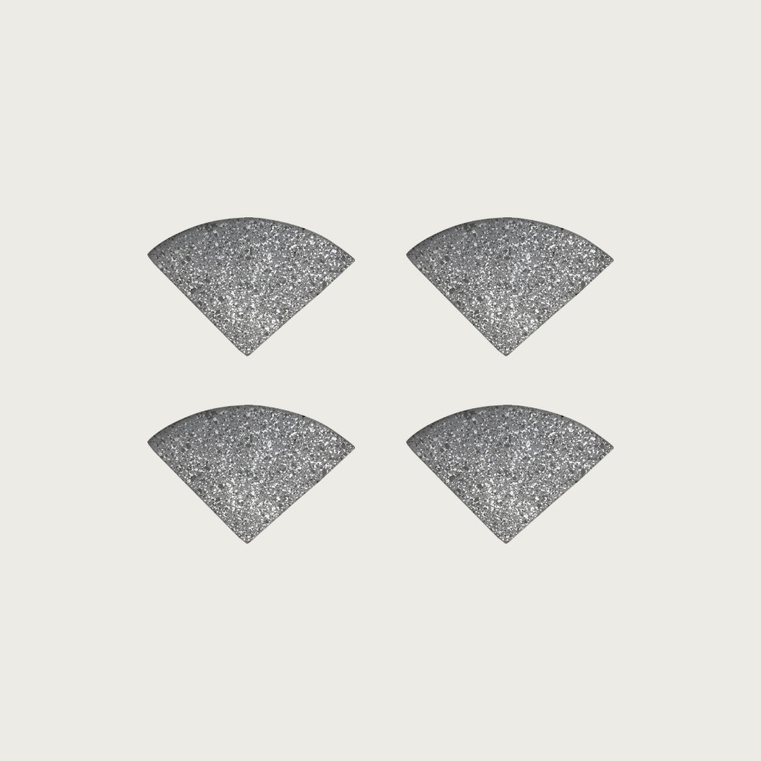 Four Graphite mid-grey terrazzo pot feet — one set of four, for a round or square pot