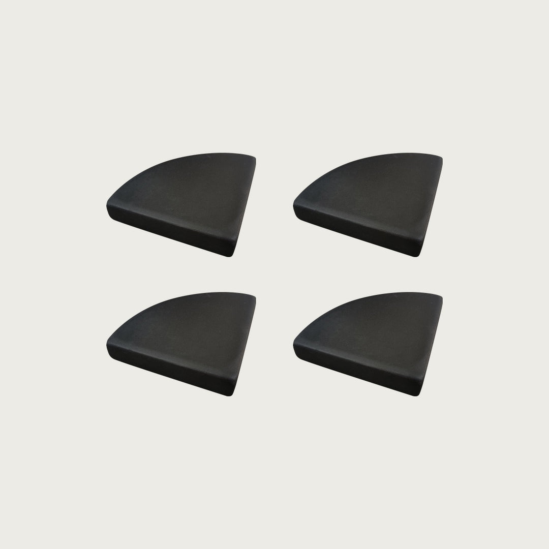 Four Raven near-black terrazzo pot feet — one set of four, for a round or square pot