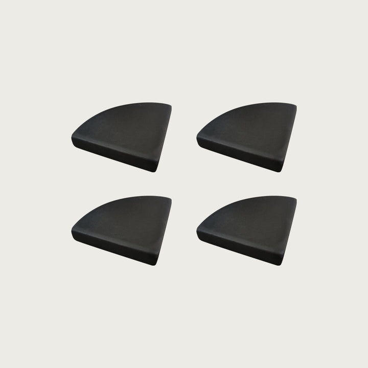 Four Raven near-black terrazzo pot feet — one set of four, for a round or square pot